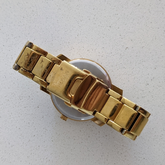 Gold MVMT watch with pearl face - Picture 2 of 3